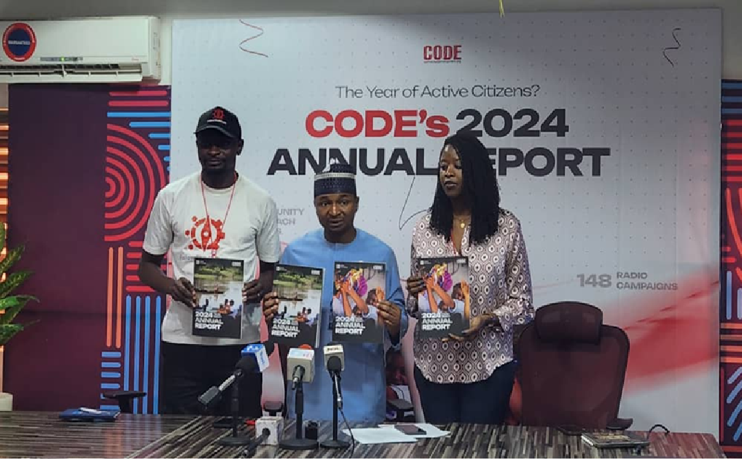 Hamzat Lawal delivers CODE’s 2024 Annual Report in Abuja, highlighting civic engagement, transparency, and education reform.