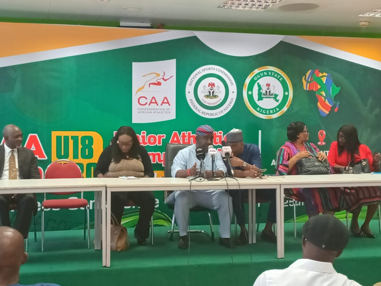 NSC Director General Bukola Olopade addresses media on Favour Ofili’s national status during the CAA U18/U20 Championships in Abuja.