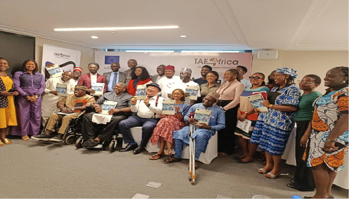 Stakeholders and disability rights advocates discussing electoral inclusion reforms at a policy meeting in Abuja