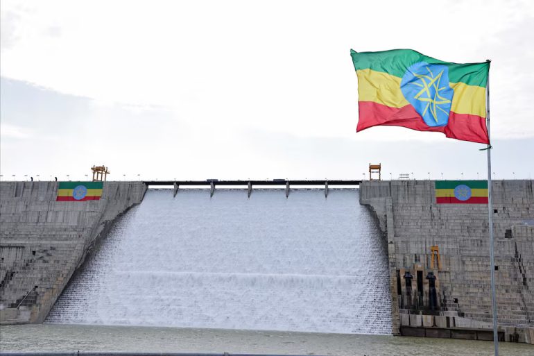 Prime Minister Abiy Ahmed hails the Grand Renaissance Dam as a symbol of African achievement during its inauguration, despite regional concerns from Egypt and Sudan.