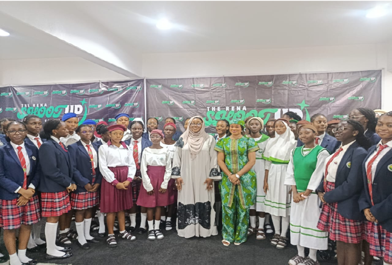 A student speaking on stage at the RENA Shoot Up Conference 2025 in Abuja, as experts stress inclusion and leadership for the girl child.