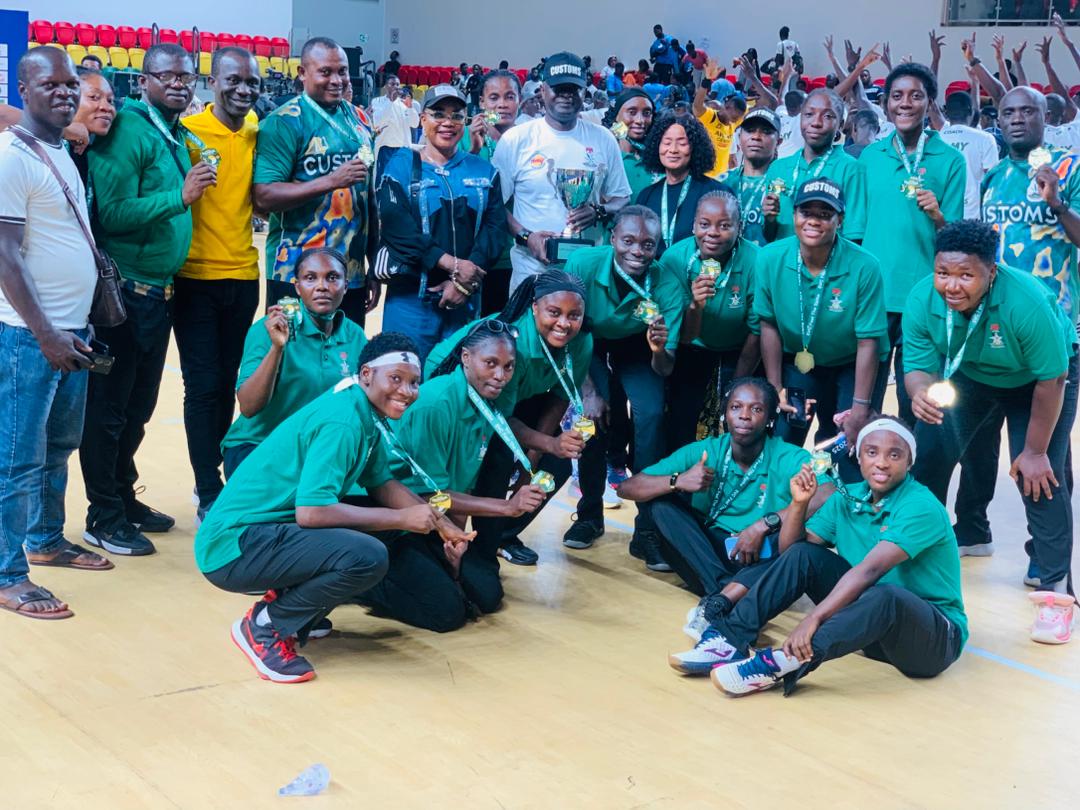 Nigeria Customs Service women’s volleyball team lifting the 2025 Super Volleyball Championship trophy after defeating Ghana Air Force 3-0 in Accra.