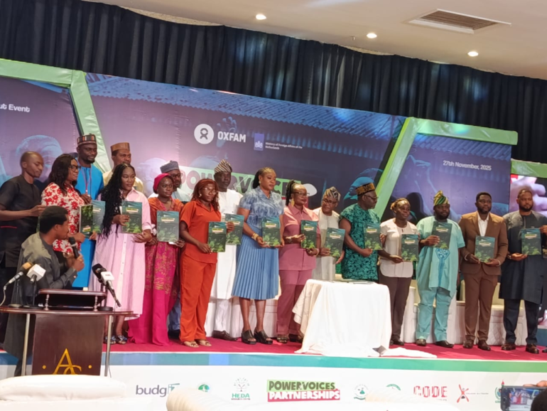 Oxfam Country Director John Makina and CISLAC Executive Director Auwal Rafsanjani at the Power of Voices project close-out in Abuja.