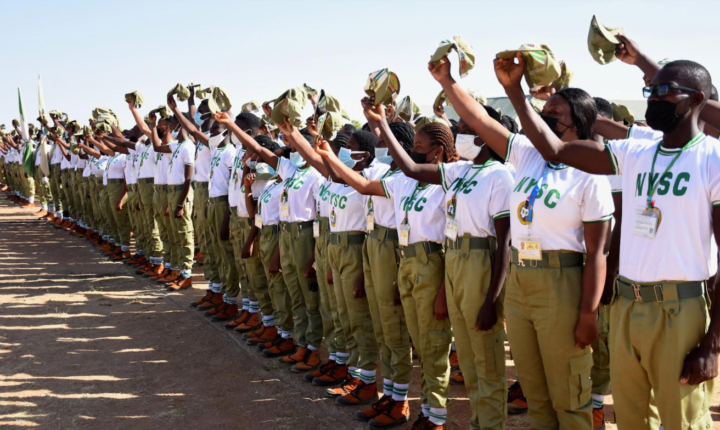 NYSC Batch A prospective corps members checking call-up letters for 2026 orientation exercise.