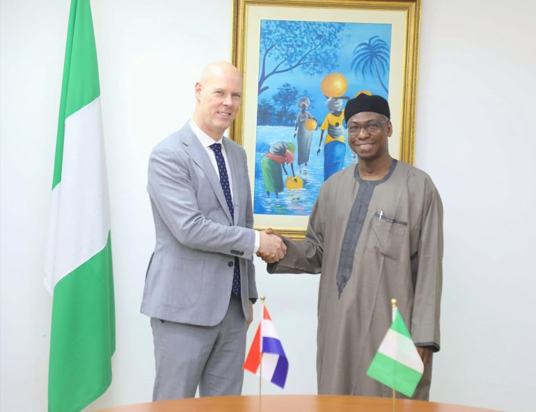 “Nigerian and Dutch officials in Abuja discussing trade, security, and development partnership”
