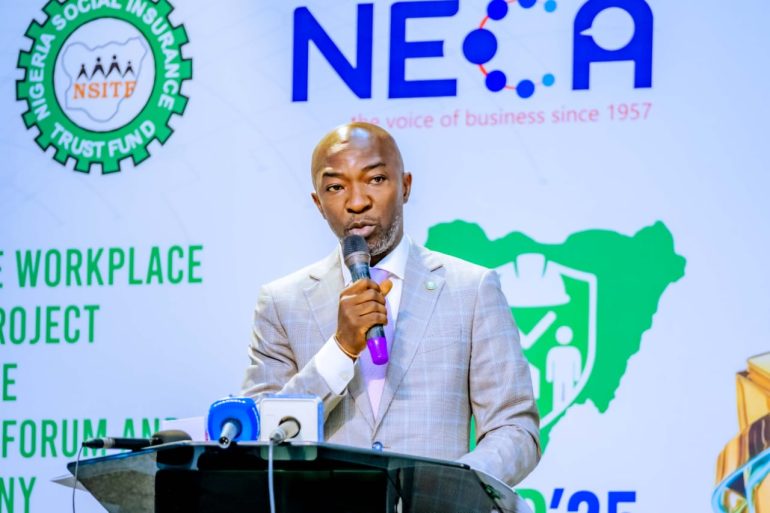 NSITF Managing Director Oluwaseun Falaye speaks at 2025 SWIP Lagos forum, promoting workplace safety and awards for compliant organisations.