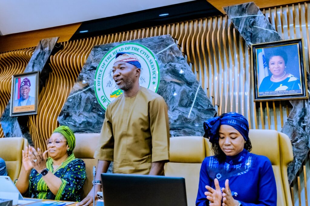 Oluwaseun Faleye, NSITF Managing Director, addressing a press briefing in Abuja on the Employees’ Compensation Scheme and federal civil service welfare reforms.
