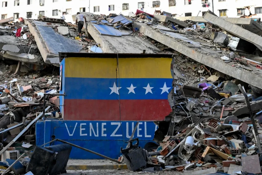 Emergency workers and mourners gather during burial ceremonies for victims of the deadly twin earthquakes in Venezuela.