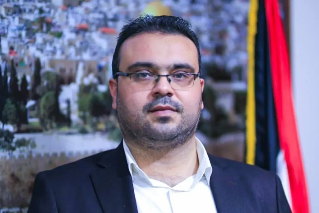 Officials meet during the announcement of Hamas' decision to dissolve Gaza's governing body and transfer civilian administration to a new technocratic committee