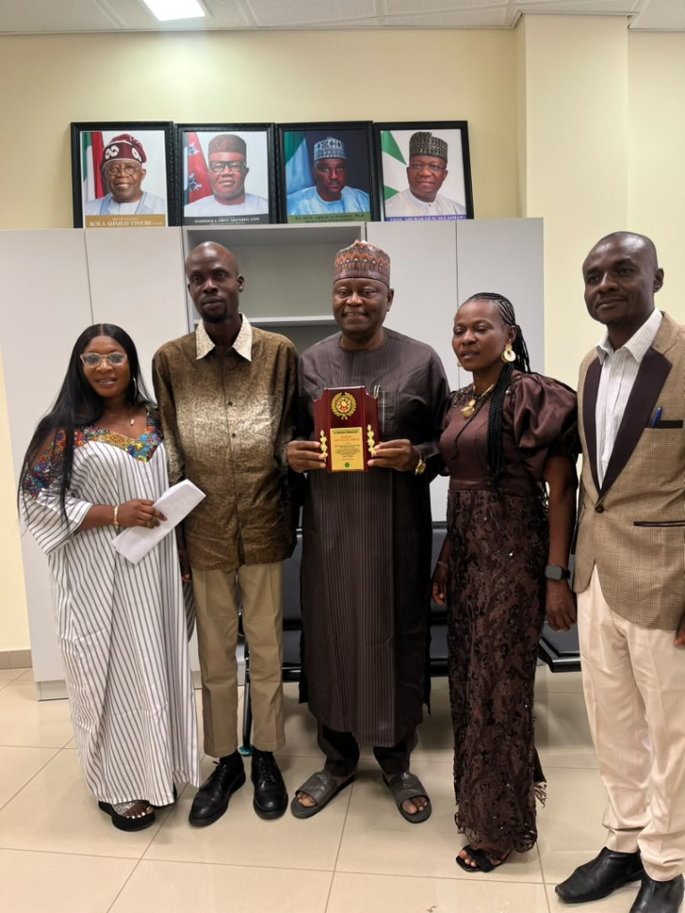 APSI presents the 2026 Spectacular Achievers Award to NILDS Media Adviser Mohammed Abdulkadri in Abuja.
