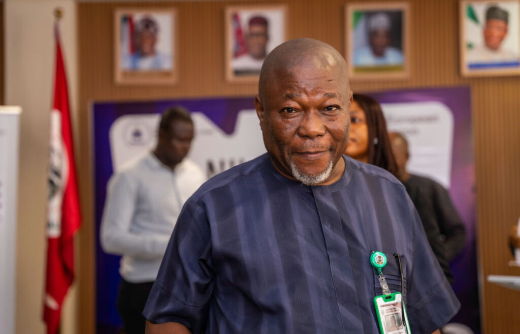 Alade Samuel, a teacher at Baptist High School, during an interview at the NILDS-EU inter-secondary school debate in Abuja.
