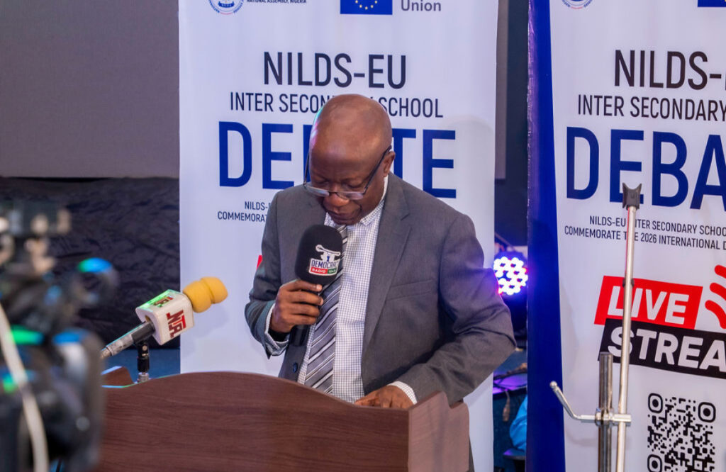 Professor Abubakar O. Sulaiman, Director-General of NILDS, speaking at the FCT Intersecondary School Debates Competition on girls’ rights in Abuja.